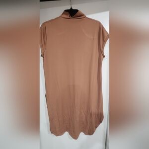 Tan color contemporary dress.
